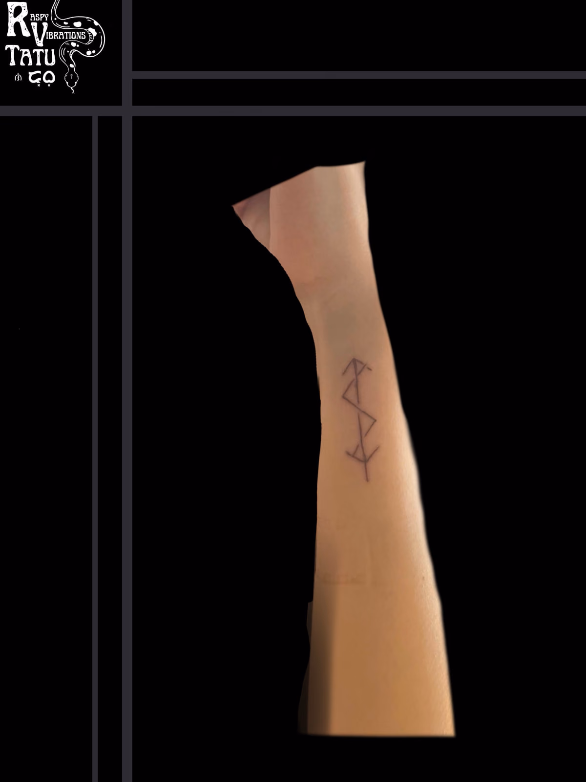 Small fine-line geometric tattoo on the inner forearm, a few angular strokes forming a compact abstract mark.