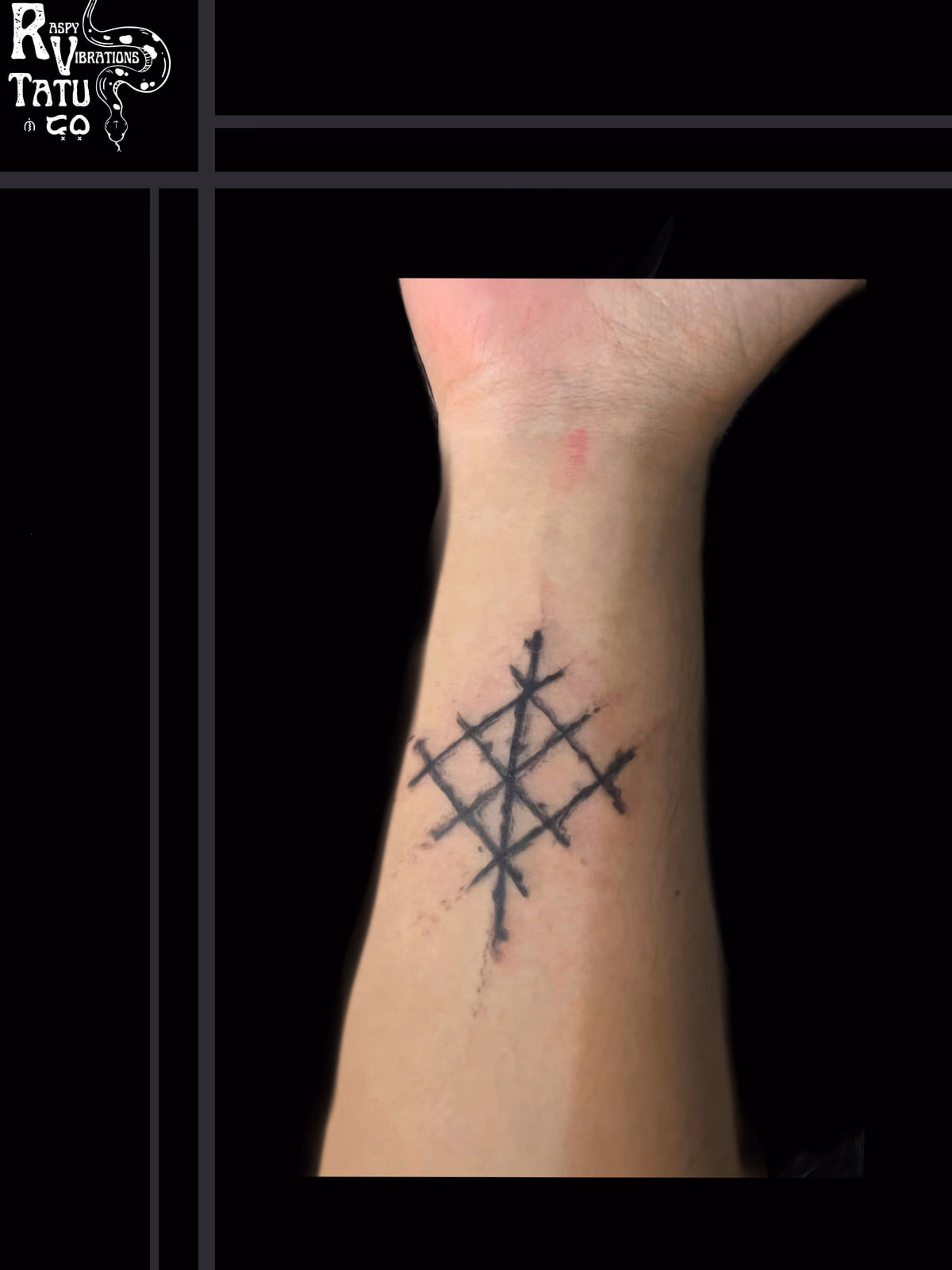 Small angular geometric tattoo on the forearm, six straight strokes crossing to form an open star-like figure.