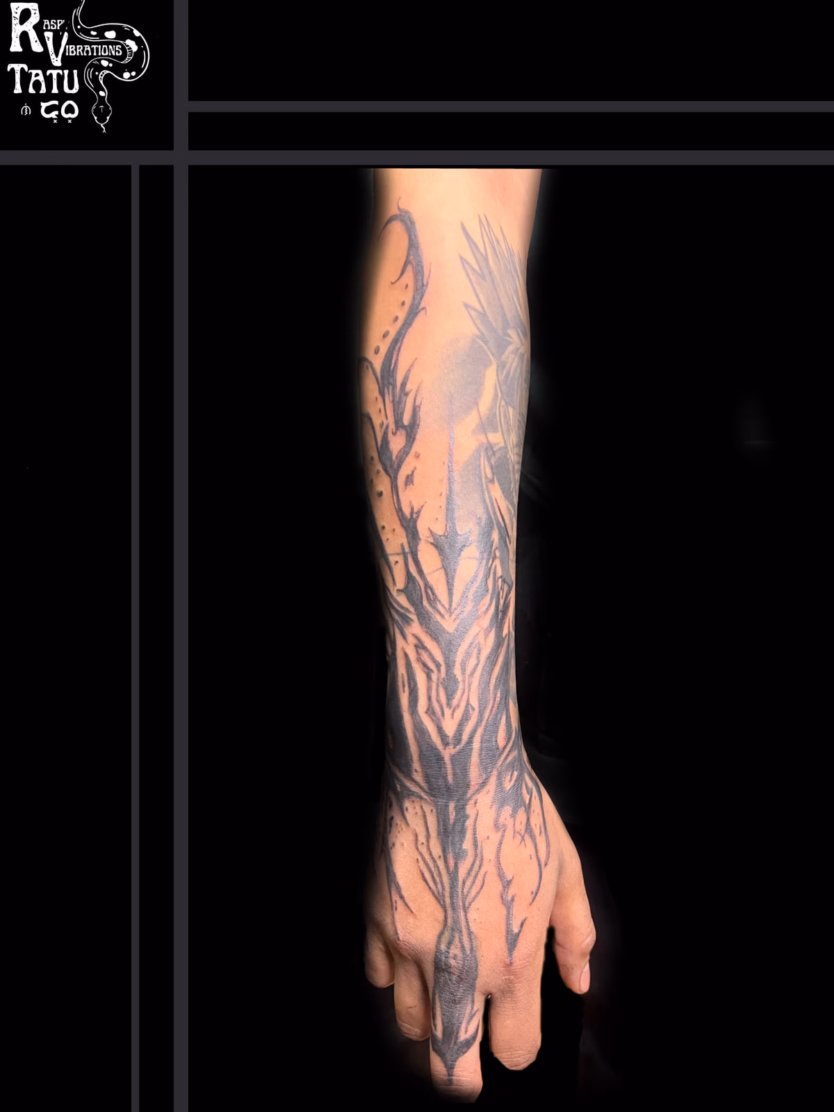Full arm sleeve tattoo of flowing organic linework running from the shoulder down the forearm and onto the back of the hand.